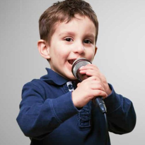 child taking voice lessons at Rogers School of Music